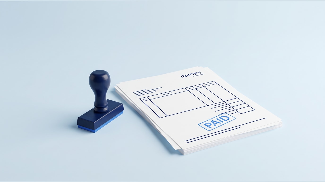 An invoice is being stamped paid