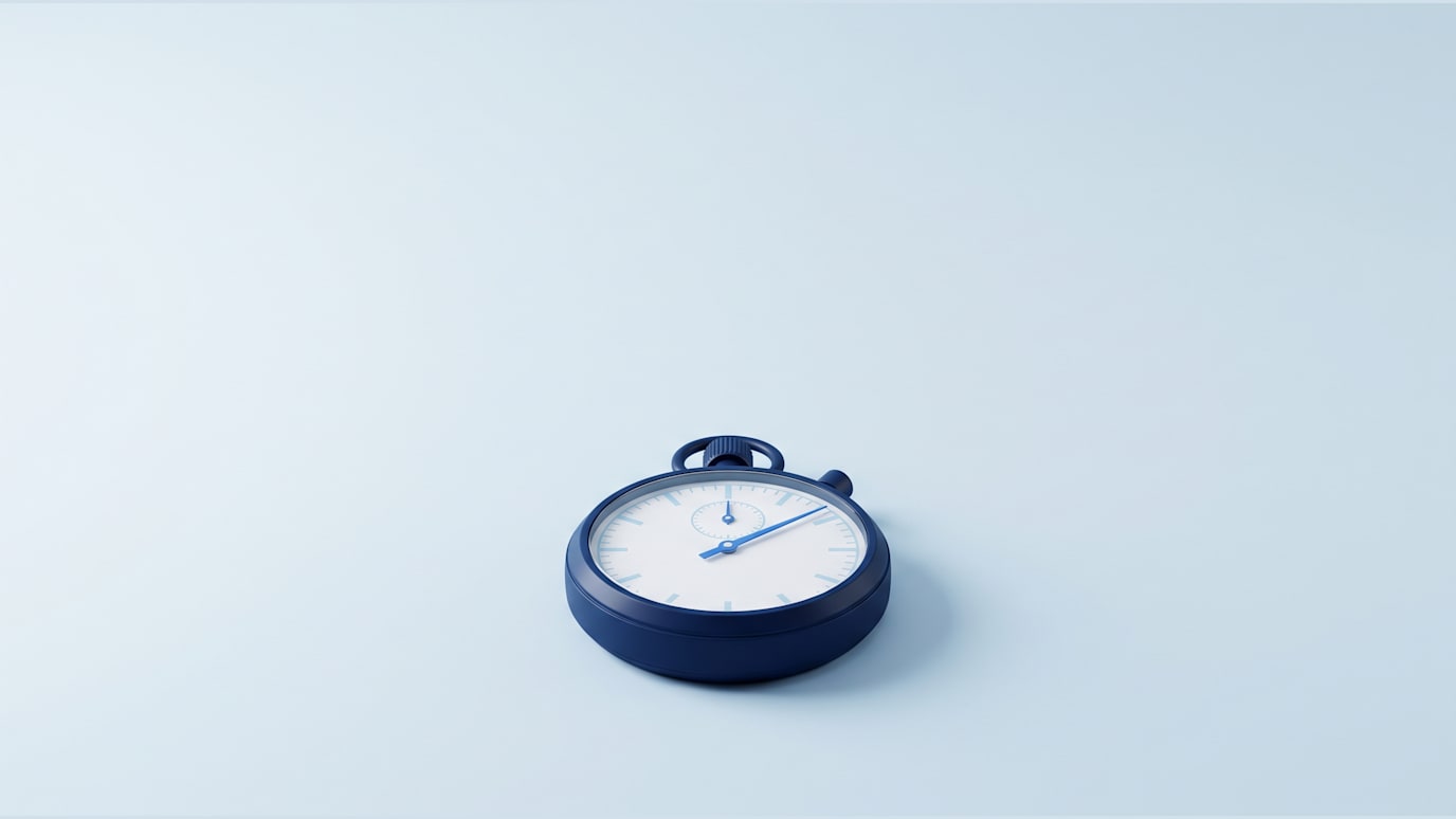 A navy stopwatch with its button pressed down