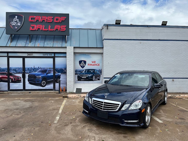 Before: a dull, everyday car dealership storefront photo